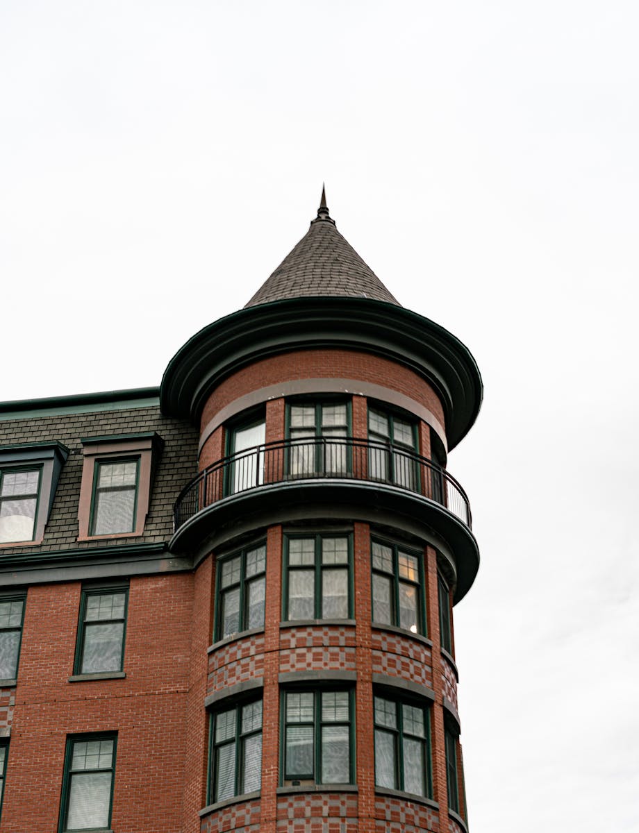 Close-up of a Victorian building's turret showcasing classic architectural design.